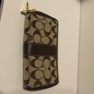 Never used Coach double zipper wallet